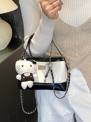 crossbody bag in black with quilted and quilted