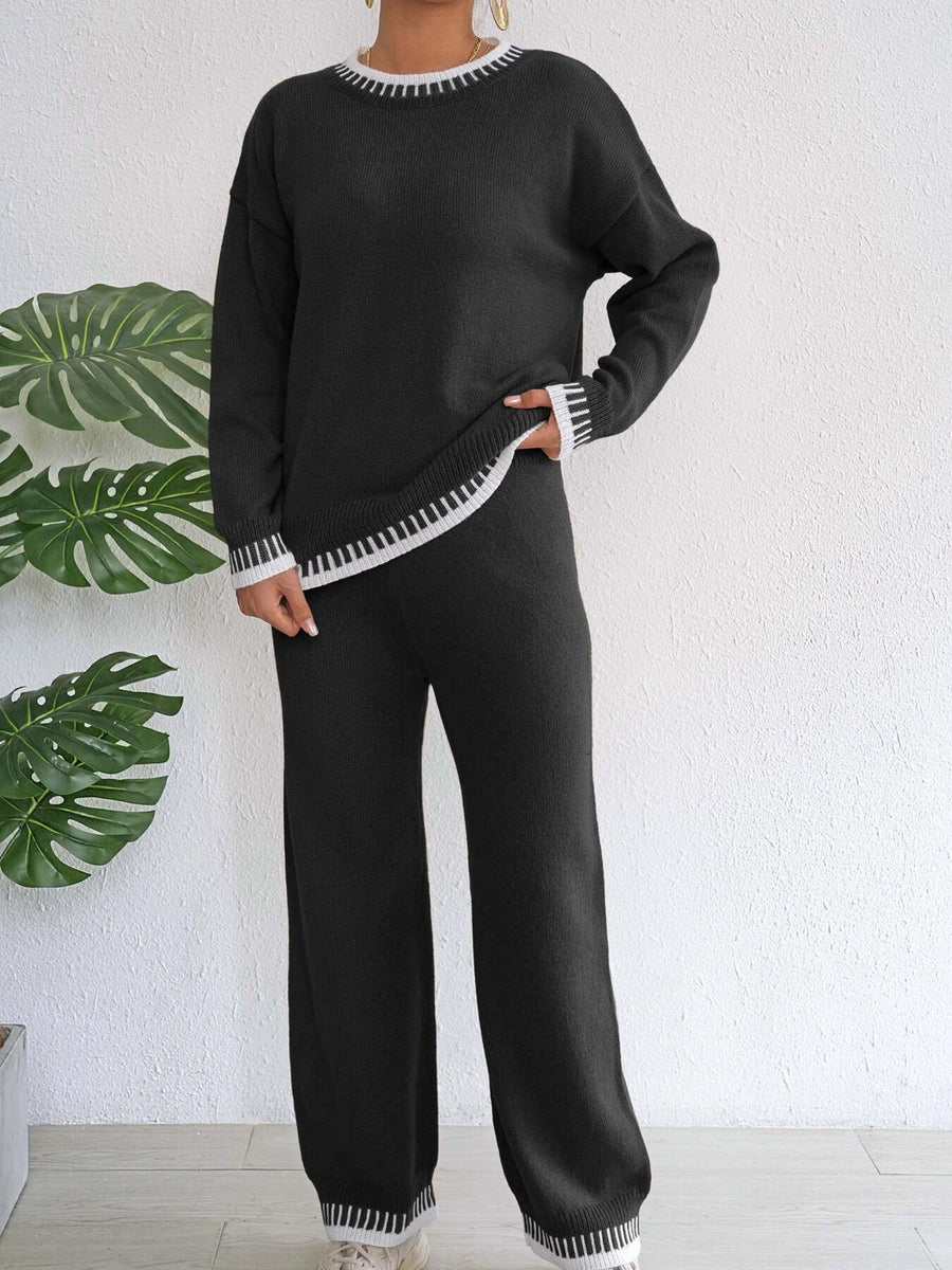 Black sweater and pants set with pullover and striped