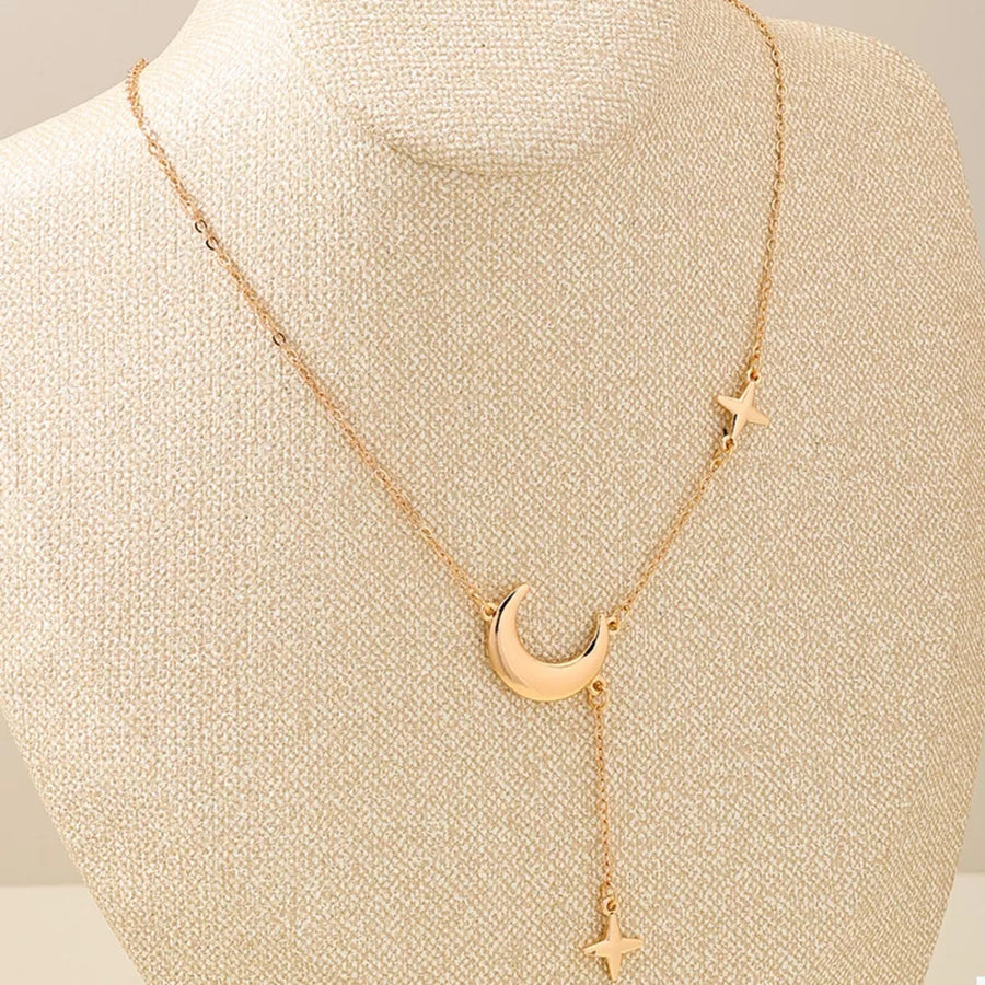 necklace in Gold with moon charm and choker