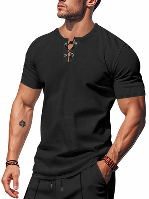Black cotton t-shirt with lace-up V-neck and short sleeves.