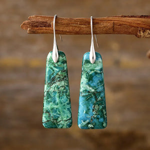 Textured stone drop earrings in green and blue with silver hooks.