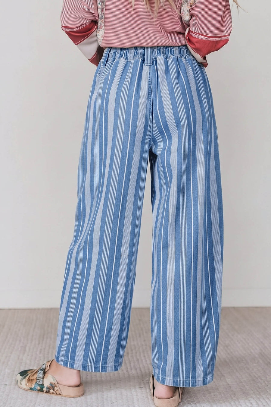 white jeans featuring drawstring waist and striped