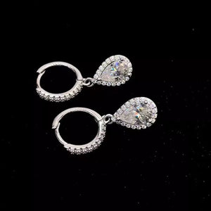 earrings in Silver with moissanite stones and 0.6 inches