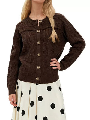 Apricot cardigan featuring buttoned and openwork knit