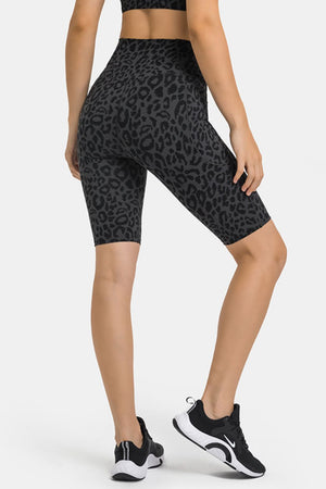 V-Waist biker shorts in black leopard print with pockets.