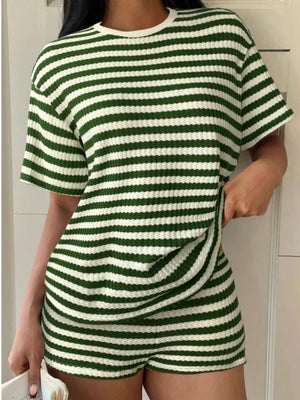 Green and white striped waffle knit loungewear set with crew neck top and shorts.
