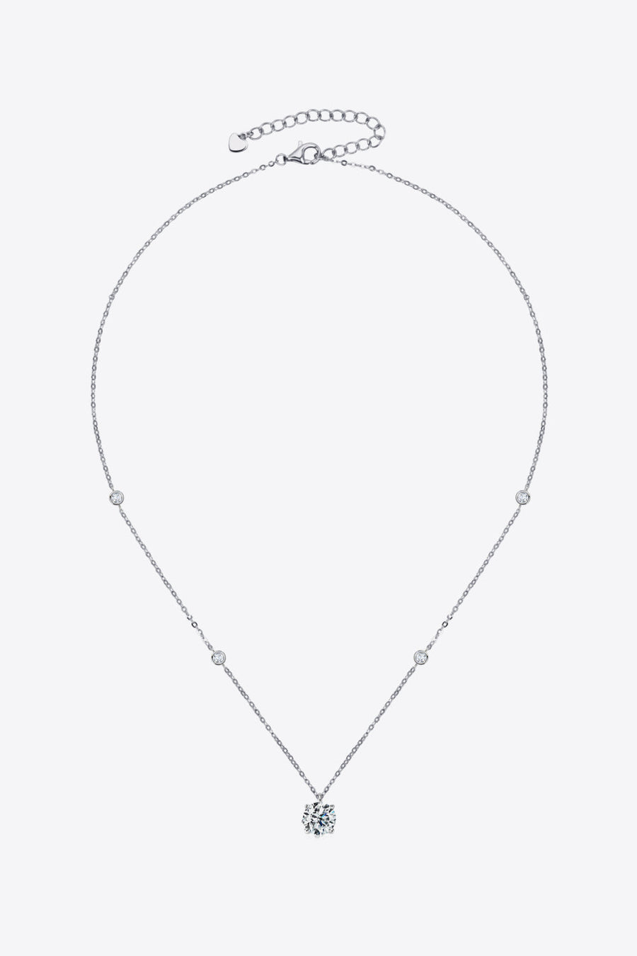 Silver solitaire necklace with scattered accent stones and adjustable chain