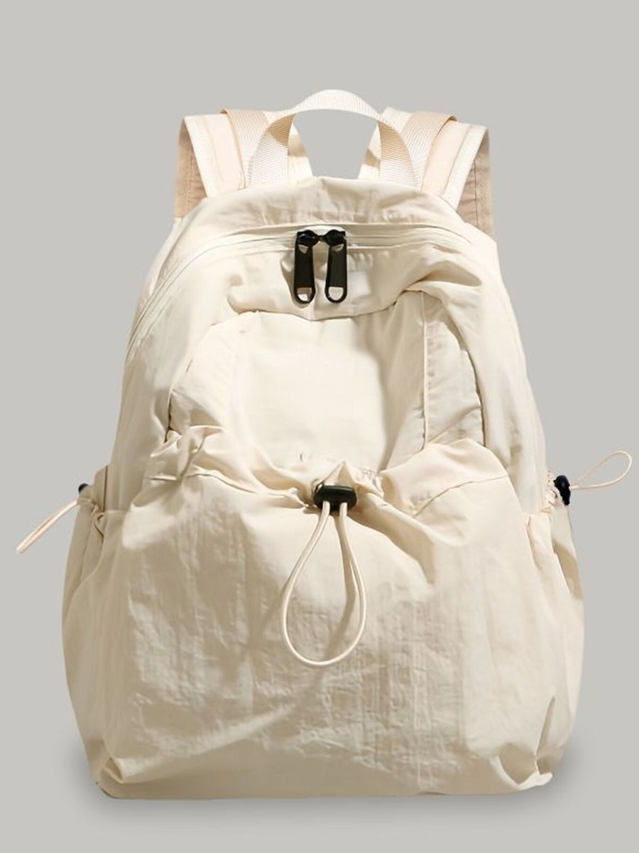 Medium lightweight nylon backpack in off-white with adjustable straps and drawstring details.