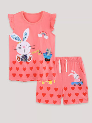 Coral cotton toddler set with bunny heart print, rainbow, and ruffled sleeves.