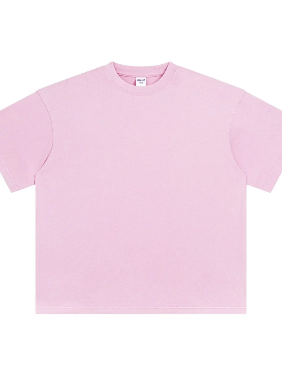 Acid wash oversized tee in blush pink with crewneck and short sleeves.