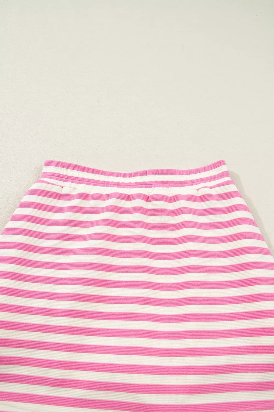 Pink and white striped bikini bottoms with elastic waistband