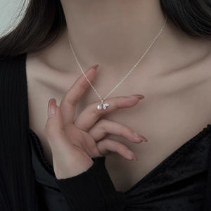 ivory necklace featuring pendant and figurative
