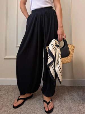 Black wide-leg pants with full-length and drawstring, elastic