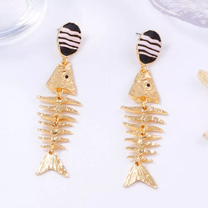 black earrings featuring drop earrings and striped