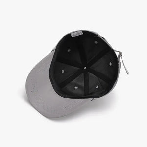 Gray baseball cap with adjustable tie-back detail and breathable design
