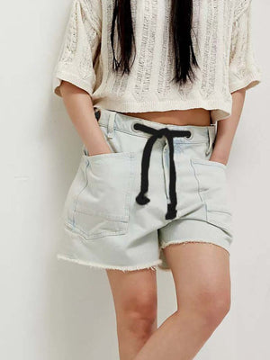 85% cotton, 15% polyester Care instructions: Machine wash cold denim shorts in Orange with relaxed silhouette