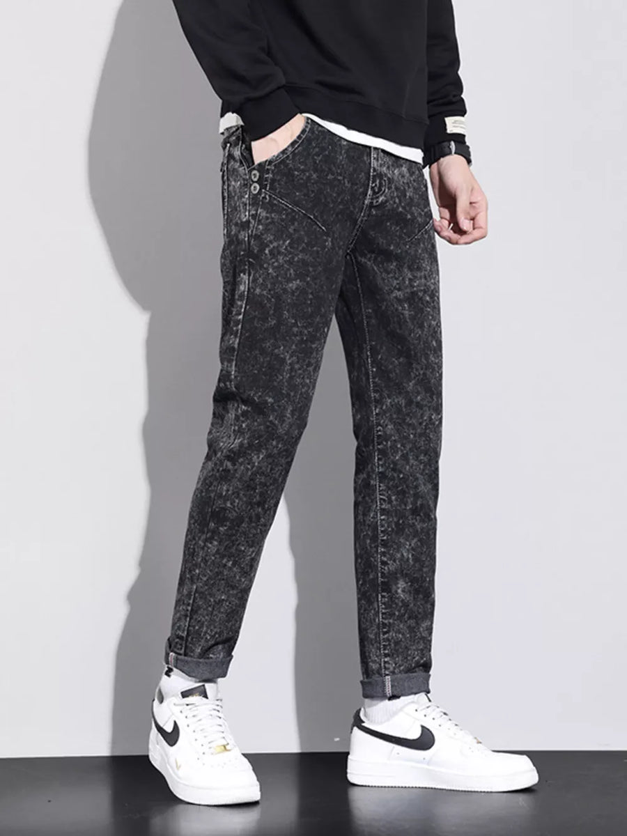 light gray jeans featuring pocketed and acid wash