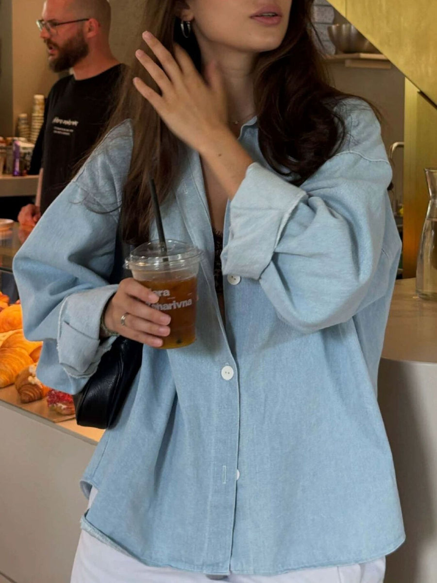 95% cotton, 5% spandex Care instructions: Machine wash cold button-up shirt in Light Blue with oversized silhouette