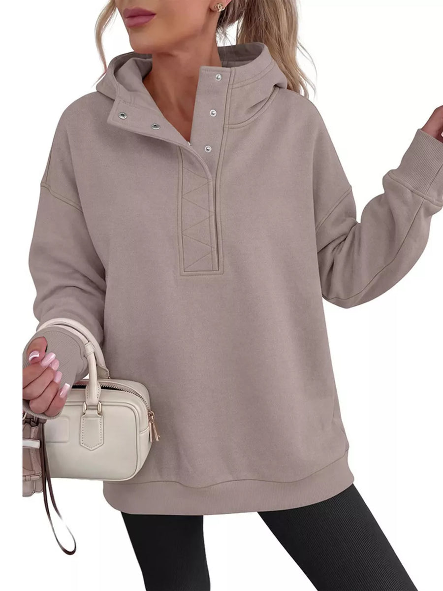 Black pullover hoodie with ribbed cuffs and long sleeve
