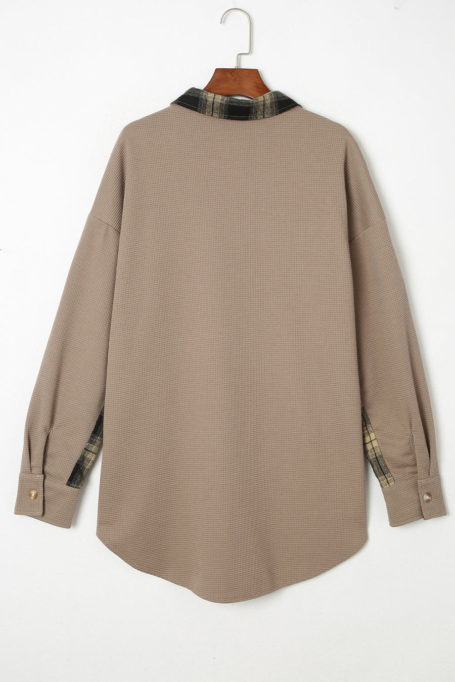 Tan waffle knit overshirt with plaid trim on collar and cuffs, button front.