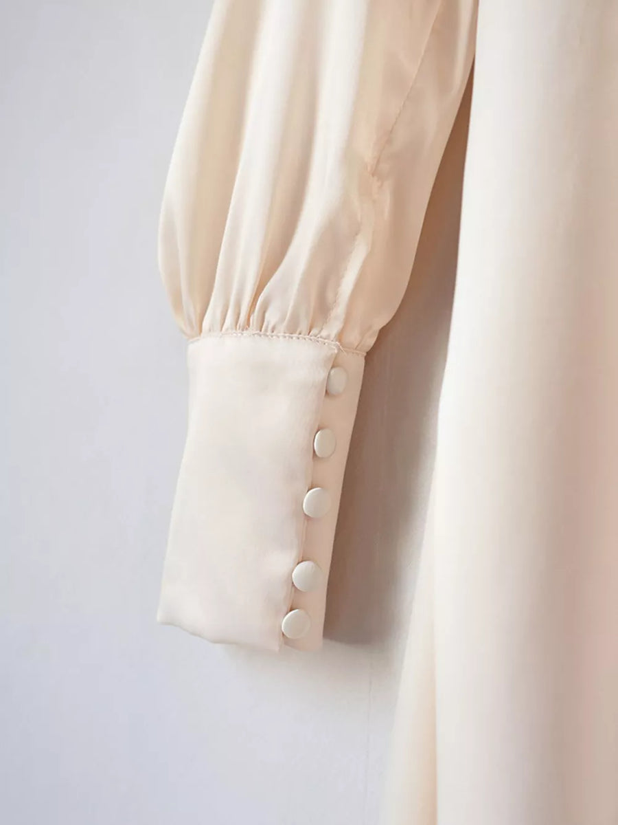 midi dress in Eggshell with v-neck and lantern sleeve