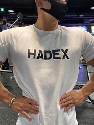 White crewneck t-shirt with bold black reversed graphic text