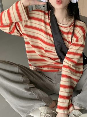 ivory t-shirt with oversized fit and long sleeve