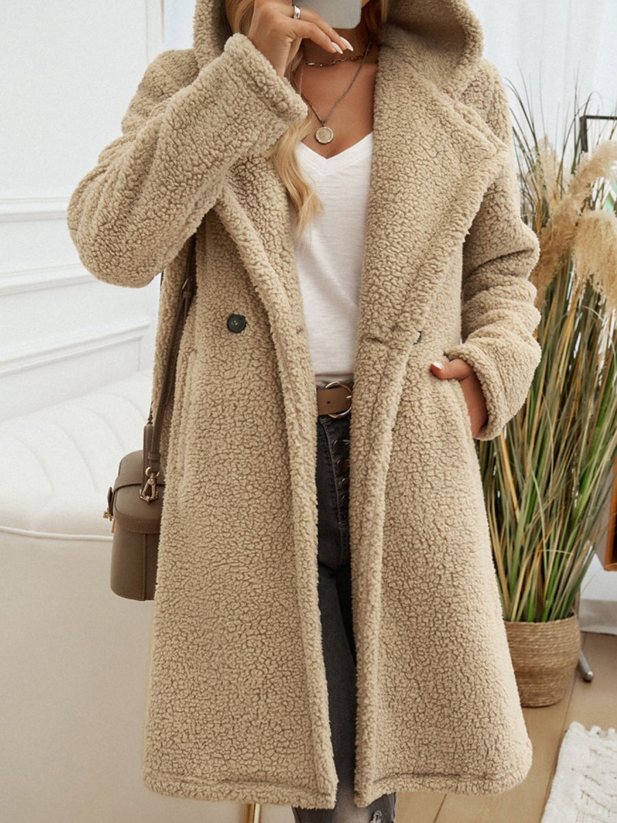 Camel teddy hooded cocoon coat with double-breasted closure and lapel collar.