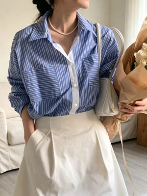 blue button-down shirt with striped and collared