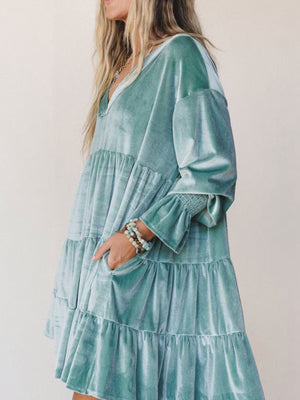 Emerald A-line mini dress with v-neck