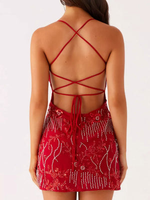 Deep Red embellished floral mini dress with crisscross back straps and beaded fringe detail.