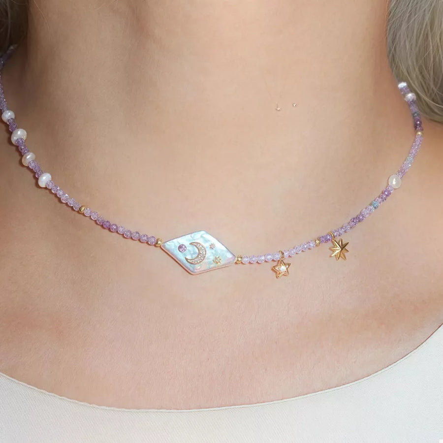 necklace in gold with star-moon and beaded