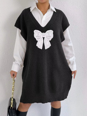sweater vest in Black with ribbed and tunic-length