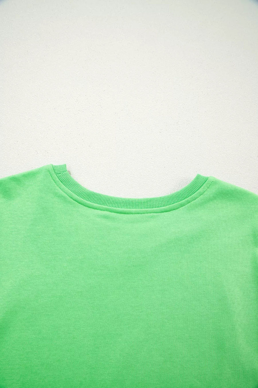Green cotton crewneck sweatshirt with ribbed collar detail