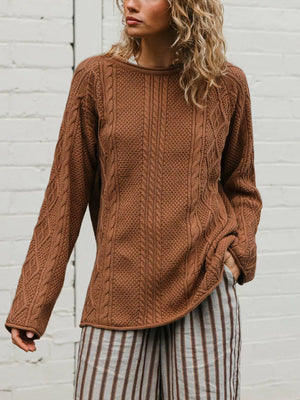 100% polyester Care instructions: Machine wash cold pullover sweater in Beige with relaxed silhouette