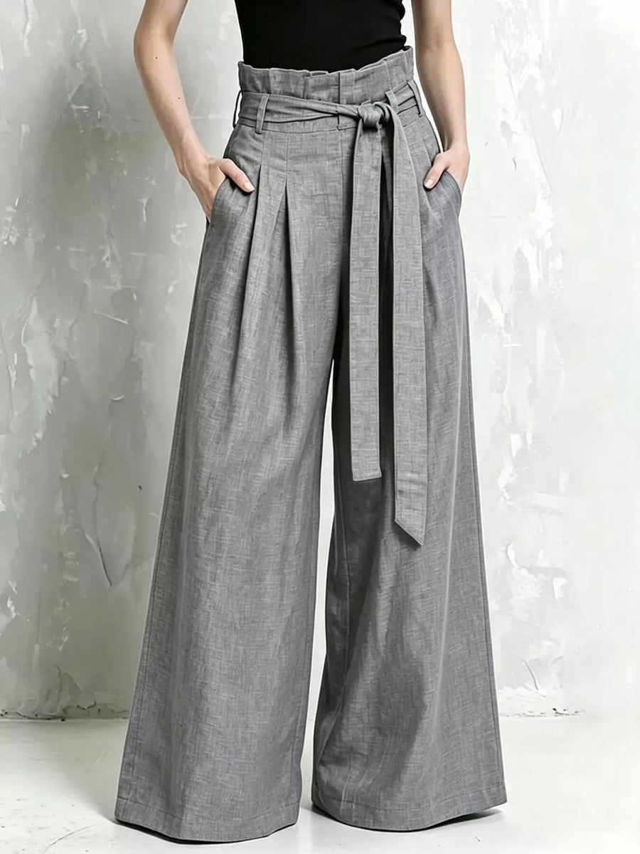 wide-leg pants in light gray featuring pocketed and wide-leg fit