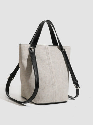 handbag in light beige with adjustable strap and small