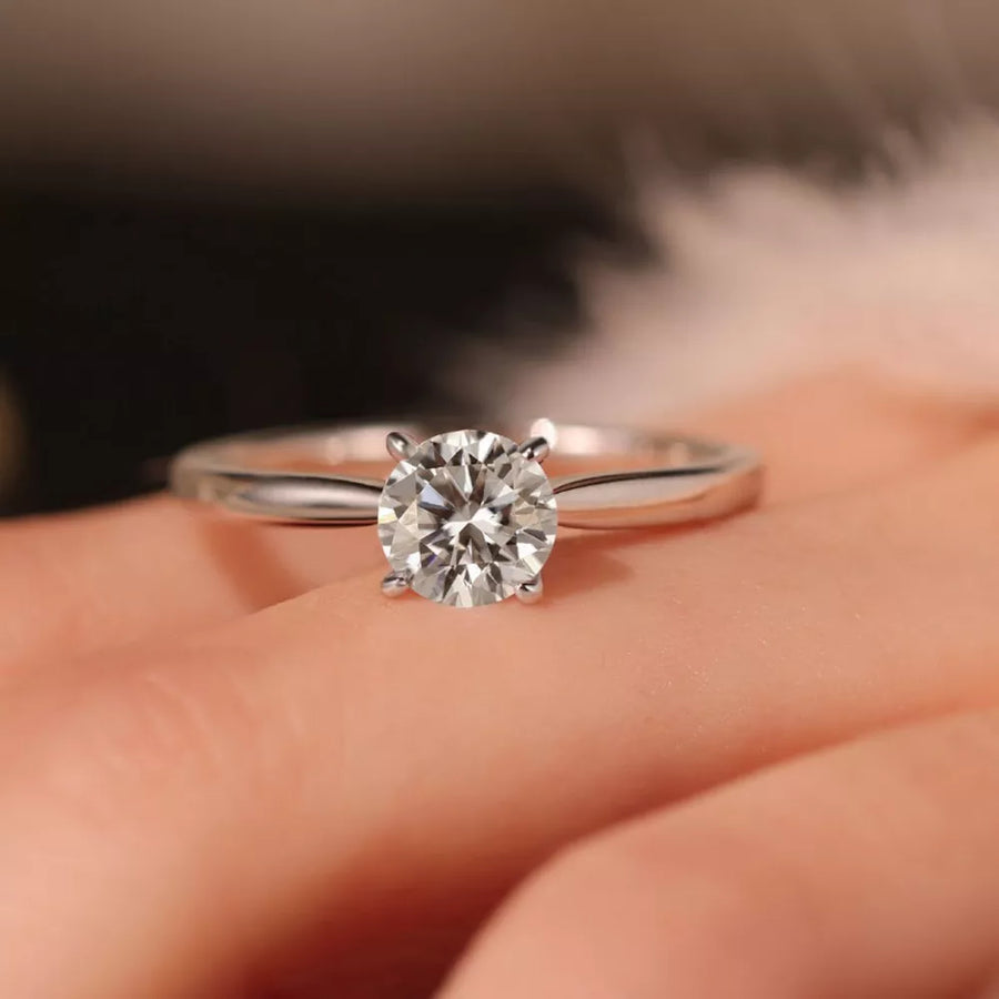 925 sterling silver,Moissanite Carat weight: 1CT Care instructions: Avoid wearin ring in clear with classic silhouette