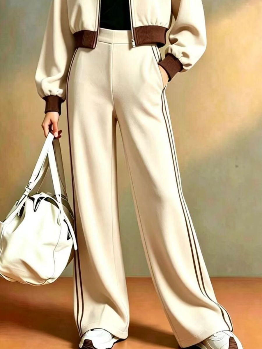 95% polyester, 5% elastane Care instructions: Machine wash cold tracksuit in Beige with relaxed silhouette