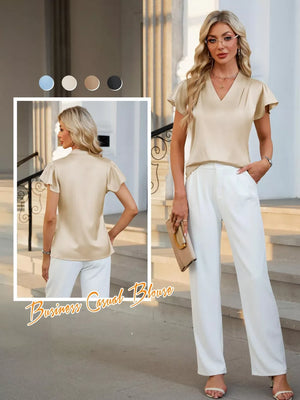 Apricot satin V-neck flutter sleeve blouse with a draped bodice.
