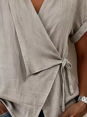 100% polyester Care instructions: Machine wash cold wrap top in White with relaxed silhouette
