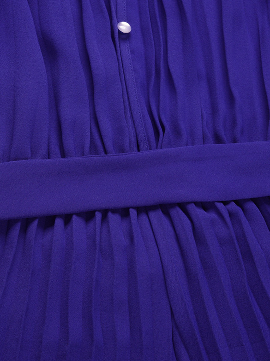 Halter neckline pleated palazzo jumpsuit in dark blue with a belted waist and button detail.
