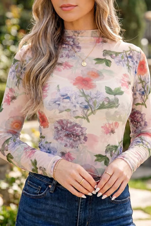 Floral sheer long sleeve mock neck top with a pastel floral print.