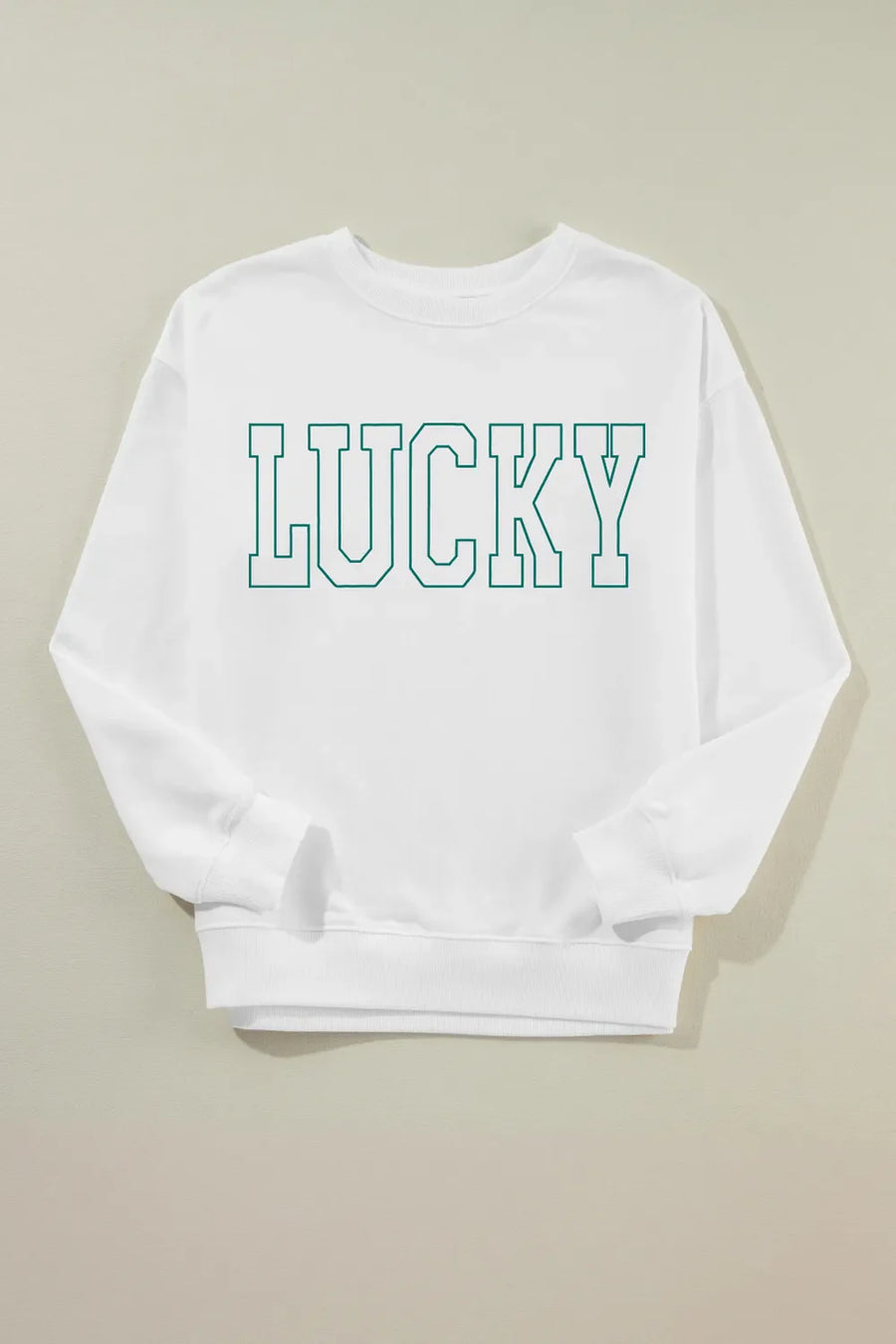 White crewneck sweatshirt with green varsity "LUCKY" graphic
