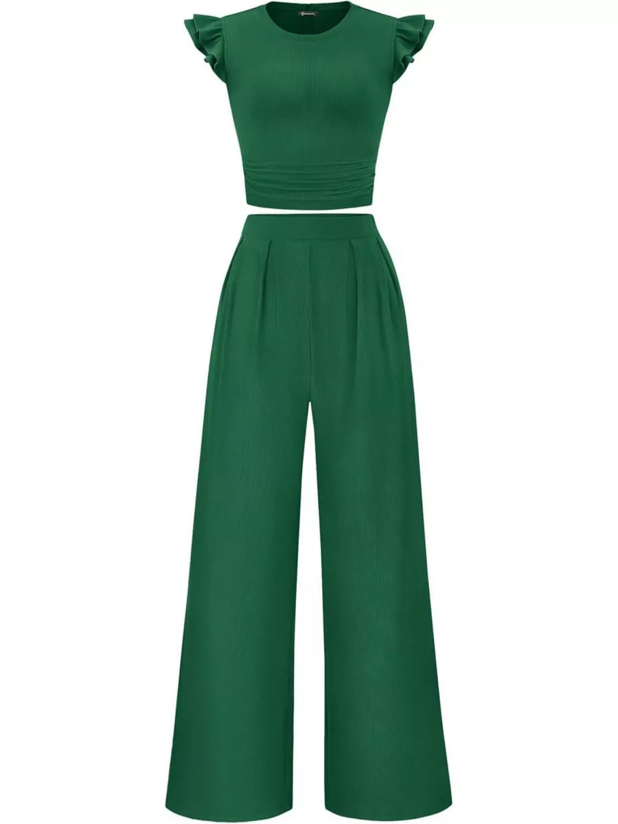 Green ruffled cap sleeve maternity top with ruched waist and wide leg pants.