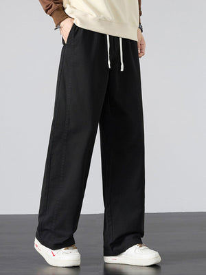 wide-leg pants in Army Green with drawstring waist and full-length