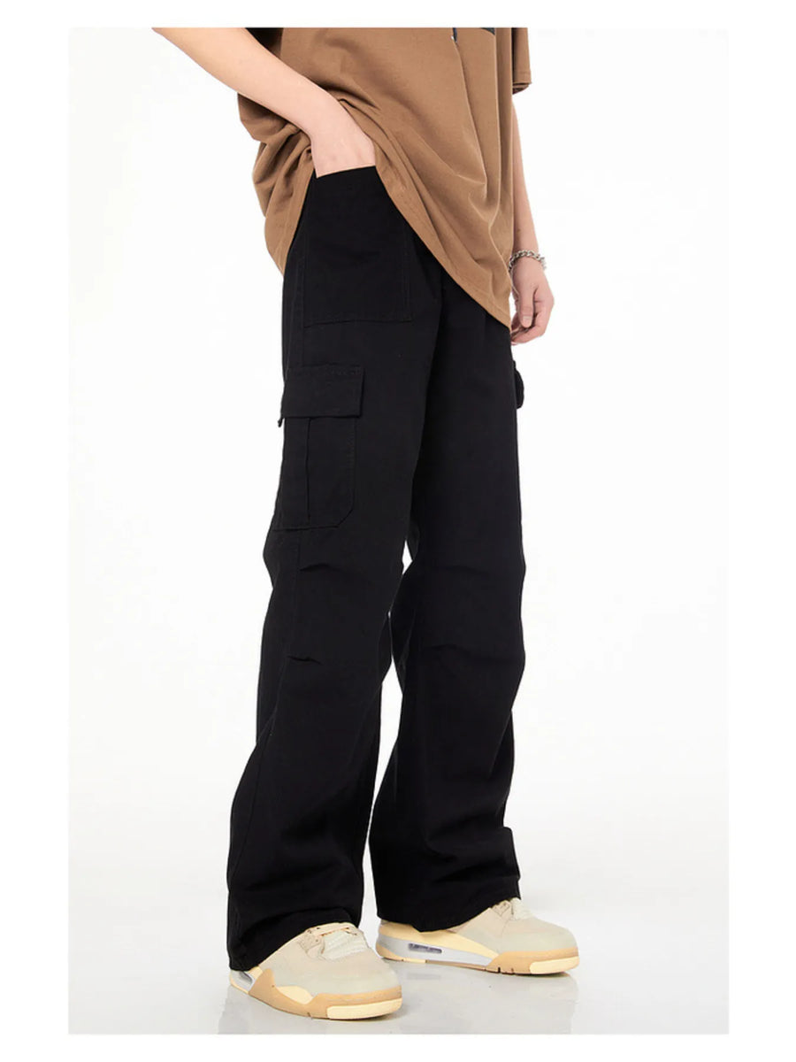 Men's black loose fit cargo pants with multiple pockets.