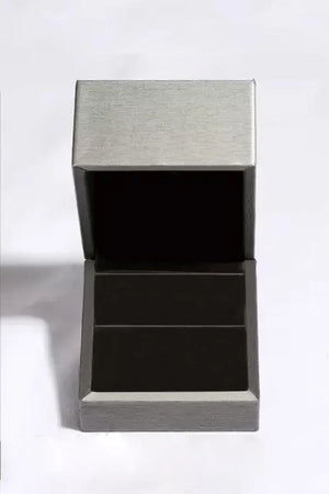 Open gray jewelry box with black interior.