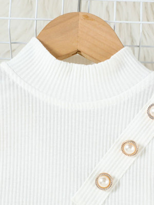 White ribbed mock neck top with pearl button detail