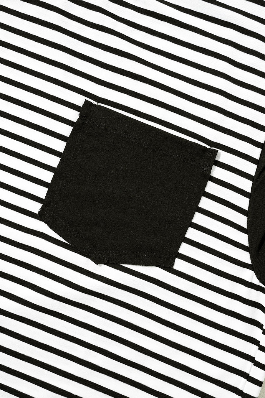 Black and white striped t-shirt with a black chest pocket detail.